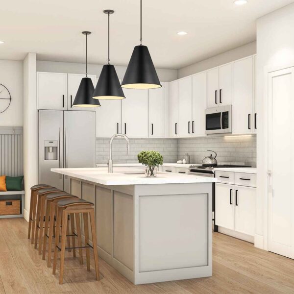 A modern kitchen with white cabinetry, stainless steel appliances, an island with bar stools, pendant lights, and a wooden floor. Clean and well-lit space.