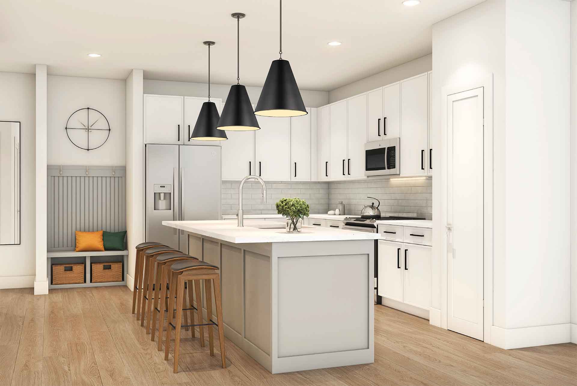 A modern kitchen with white cabinetry, stainless steel appliances, an island with bar stools, pendant lights, and a wooden floor. Clean and well-lit space.