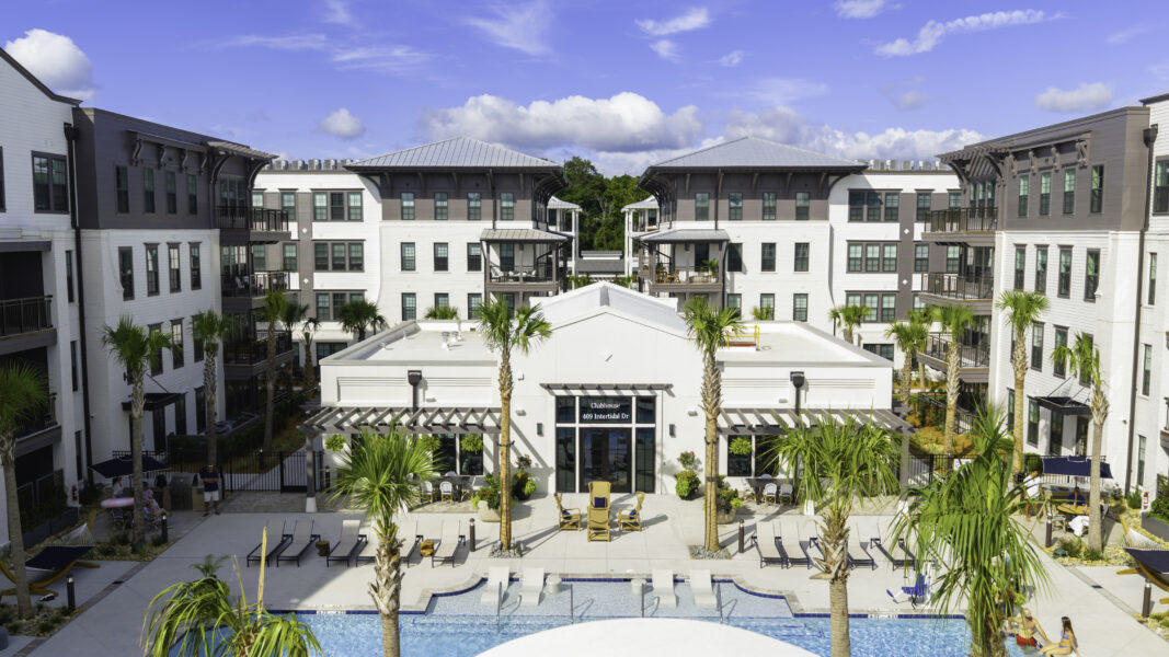 Aerial of property pool deck and buildings