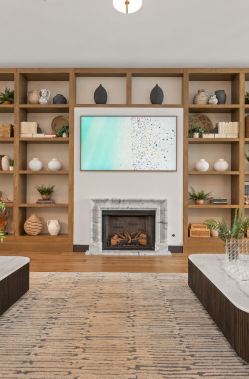 Expansive clubroom area with ample seating and television.