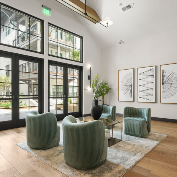 Clubroom area with ample natural light and green chairs