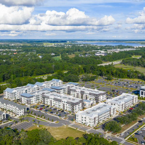Drone view of the community showing apartment buildings